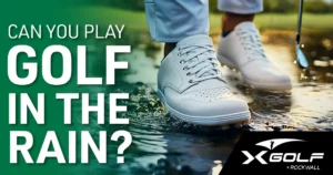 Golfer walking through a puddle on a rainy course in white golf shoes with text overlay asking 'Can you play golf in the rain?' – X-Golf Rockwall