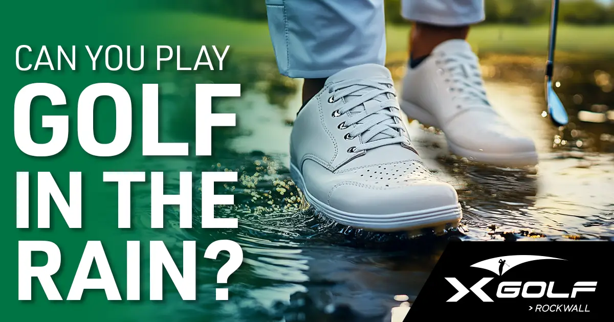 Golfer walking through a puddle on a rainy course in white golf shoes with text overlay asking 'Can you play golf in the rain?' – X-Golf Rockwall