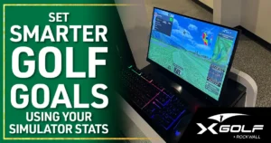 X-Golf Rockwall simulator workstation showing real-time shot data and course graphics on curved monitor