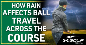 Golfer in a dark rain jacket standing on a stormy golf course with lightning in the background; text reads 'How Rain Affects Ball Travel Across the Course' with the X Golf Rockwall logo