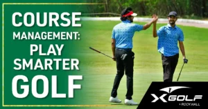 Golfer reviewing course strategy and simulator data at X-Golf Rockwall to play smarter golf